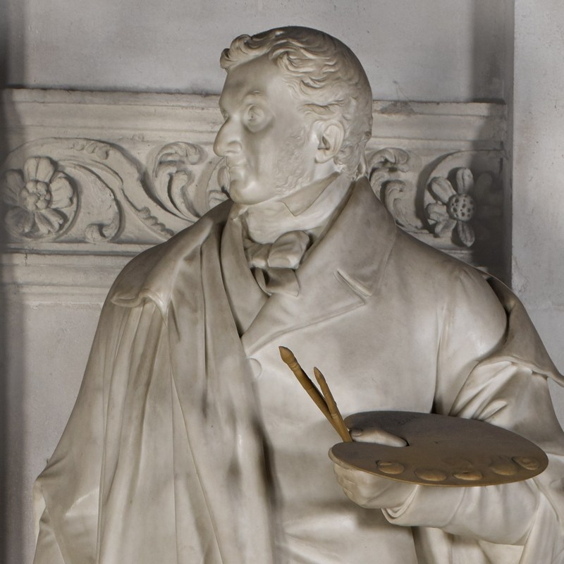 Head and shoulders of marble figure , facing left, holding paint brushes and a palette