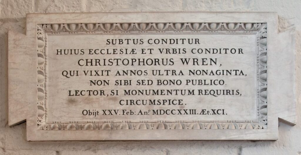 Marble panel with inscription and a decorative border